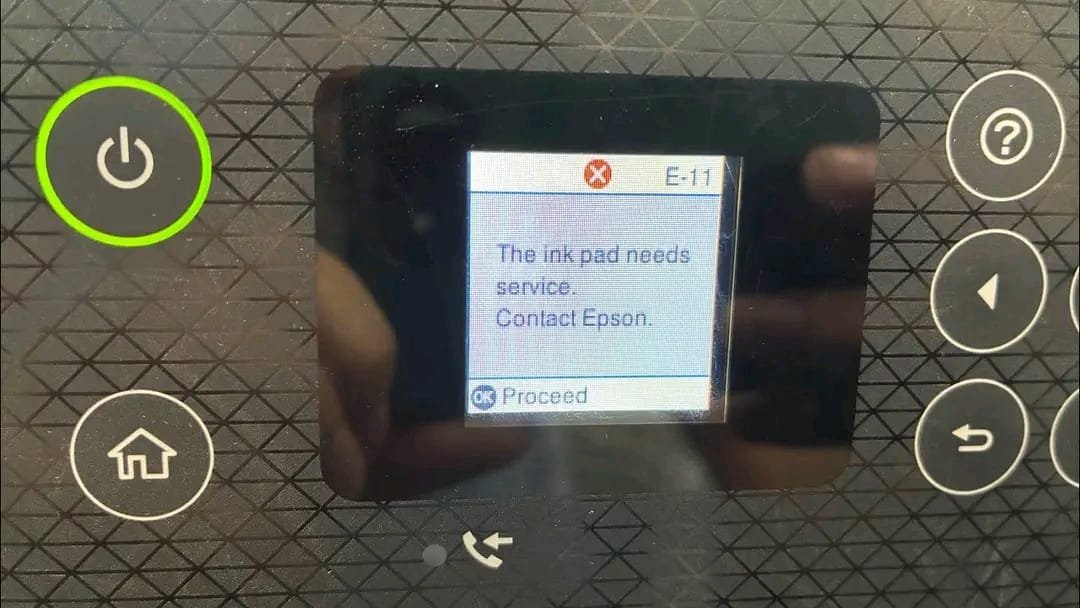 رسالة خطأ E-11 على شاشة طابعة: The ink pad needs service. Contact Epson.